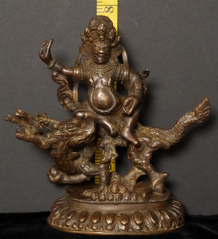 Antique Solid-cast Mongolian deity on dragon. - 9