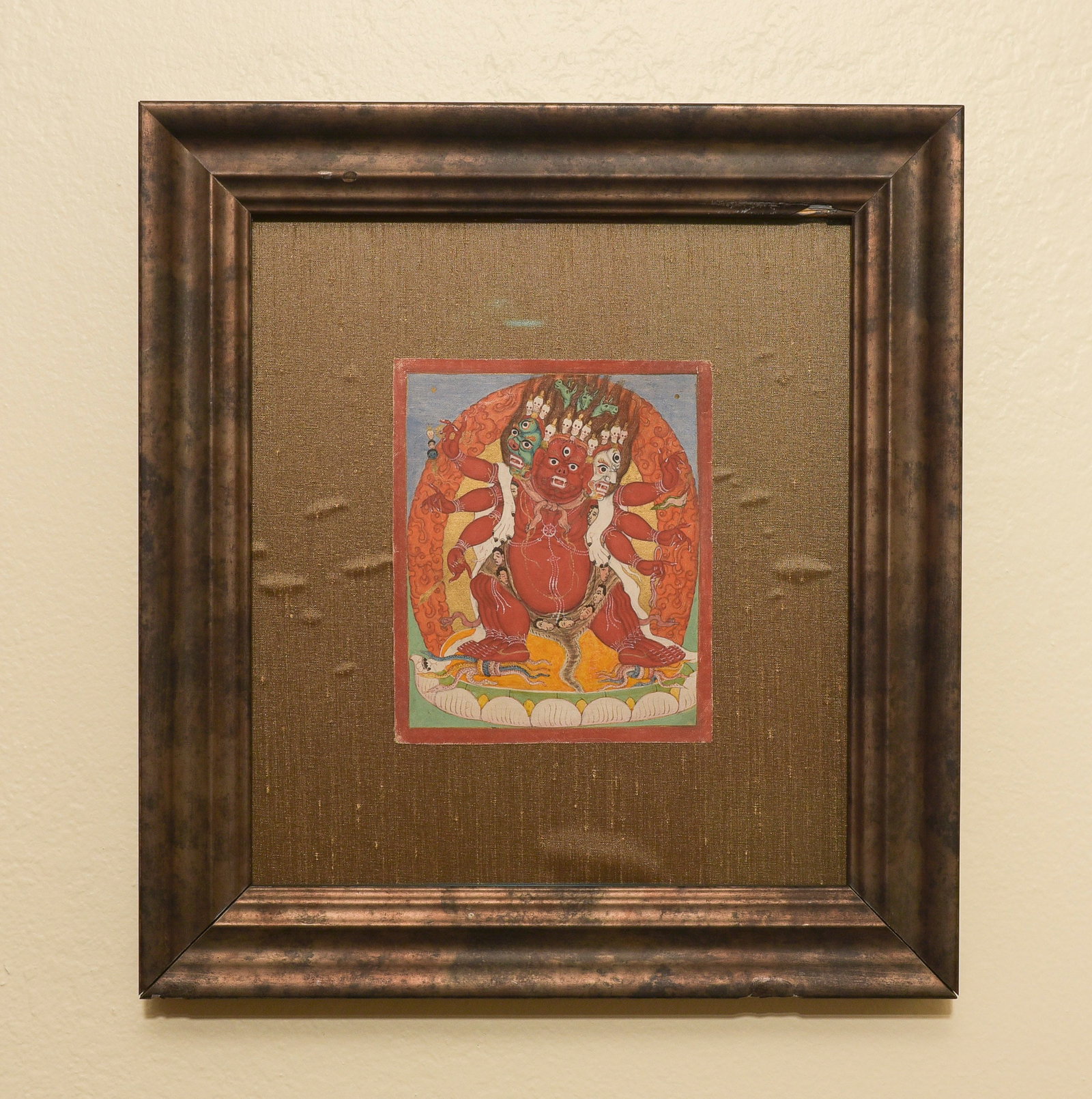 Beautiful Old Thangka in Museum Quality Display: Fine old Thangka framed with museum glass, silk, and best quality materials. Best of its type and remarkably clean- spent all of its life in a Gau box. Thangka is 4-5/8 x 5.5 inches, frame measures
