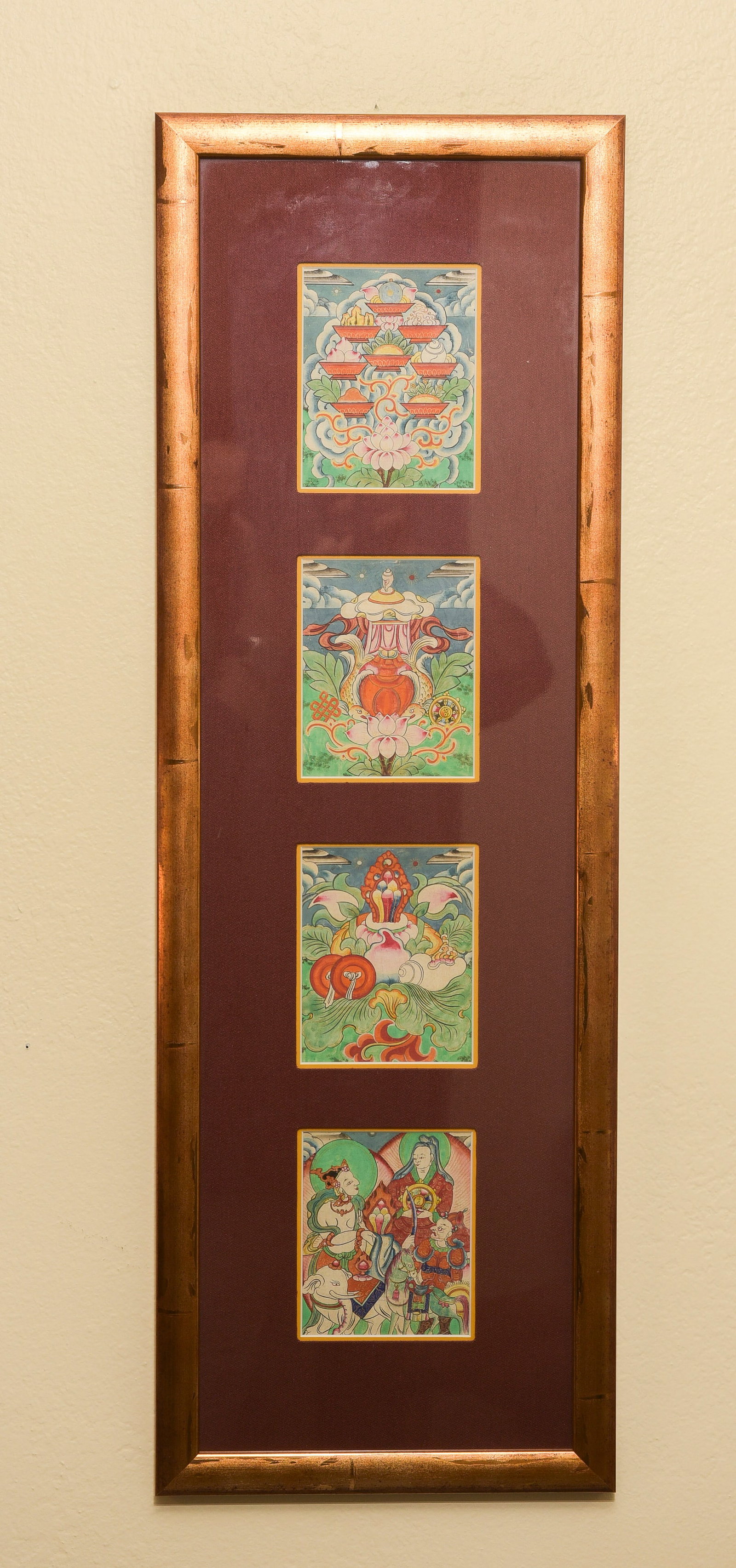 A set of 4 antique Mongolian Thangkas in a custom vertical frame. (1 of 13)