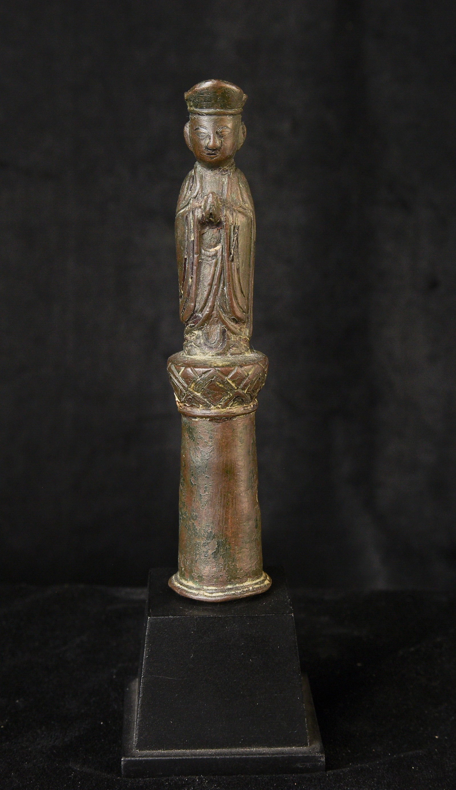 10/11th C Chinese Buddha Bronze Monk-Liao Dynasty- very sweet- Finial- Authentic, Rare: MONK/BUDDHA, 10/11th Century China Liao Dynasty?very sweet face. Bronze, 5-1/4 Inches Tall, 7 inches tall on a custom stand. It looks like it originally went on top of something (i.e., was a final). I