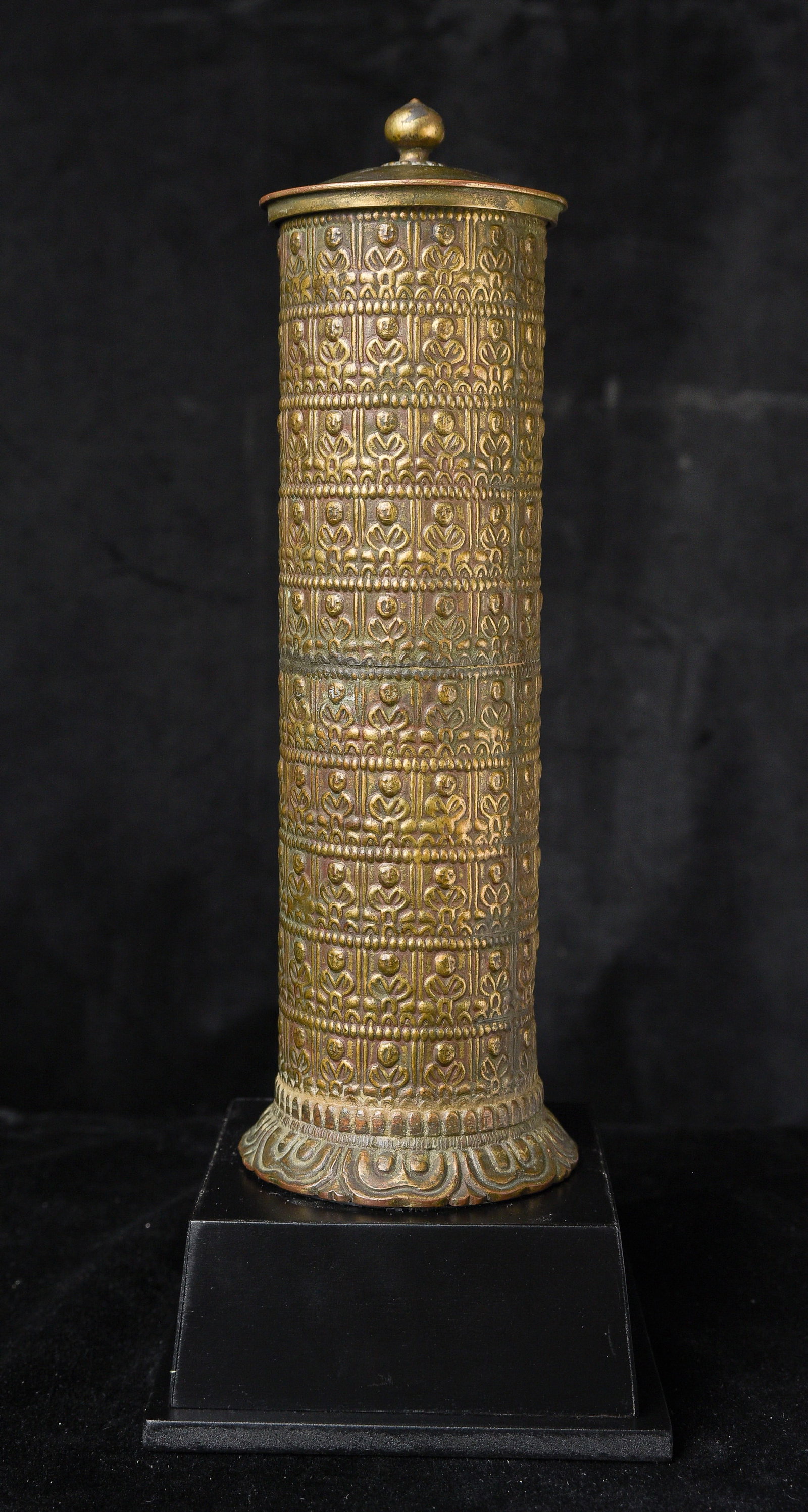 Bronze scroll case with approx. 150 Buddhas adorning: Bronze scroll case with approx. 150 Buddhas adorning it. Inside is a certificate from an expert in Japan, dated 1961, that to the best of his knowledge, the case is more than 200 years old (in 1961)