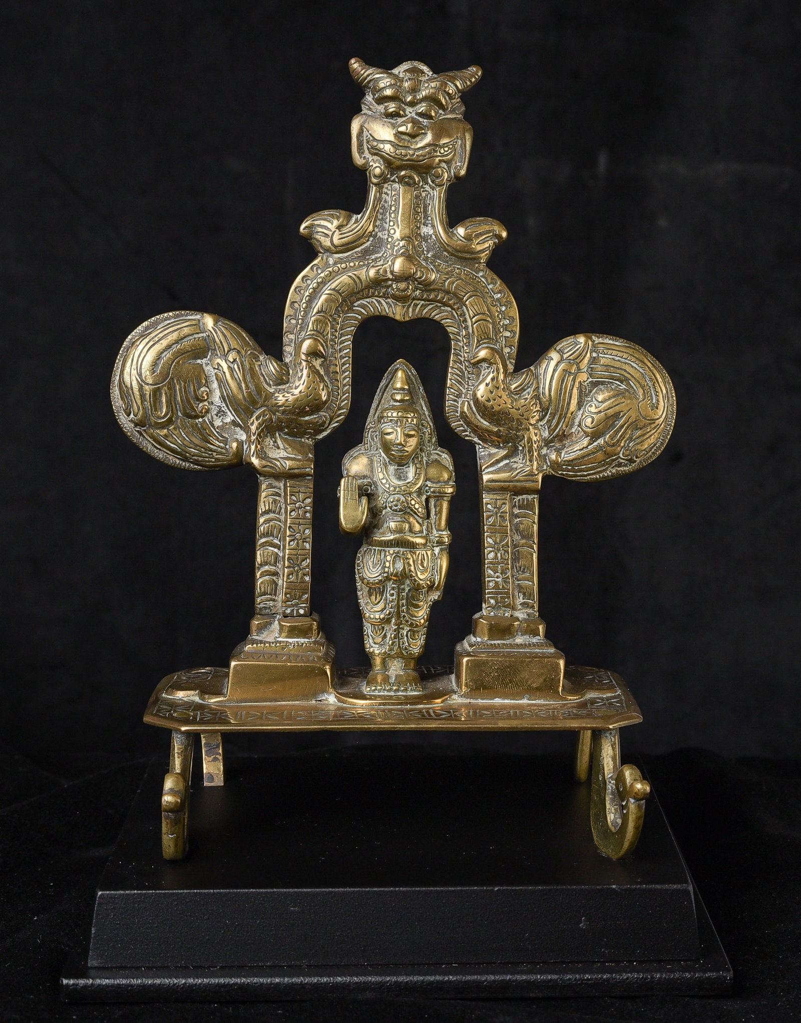 17/18thC Sri Lankan Buddha in its own altar.: 17/18thC Sri Lankan Buddha in its own altar. Very endearing Kandy folk style standing solid cast Buddha in a traditional Lankan style Altar. This piece measures 8 1/2 inches tall x 6 inches across x