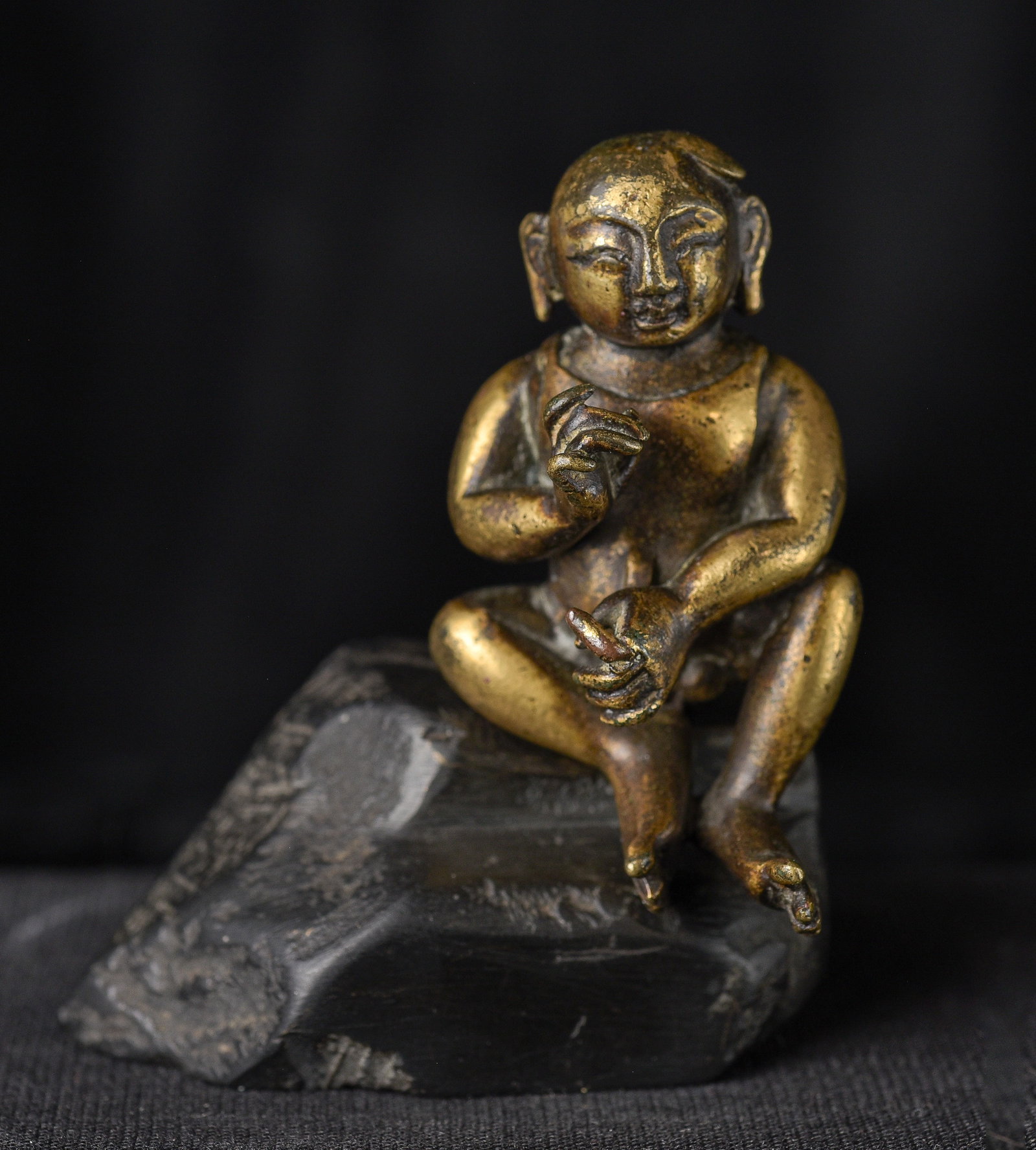 18/19thC Solid Silver Figural Baby Sculpture-Richly Gilded: Very fine richly gilded solid silver figural sculpture of a baby. The figure alone is 2 inches tall, height on the rock is 2-5/8 inches. The plinth holding him onto the base is not original and looks 