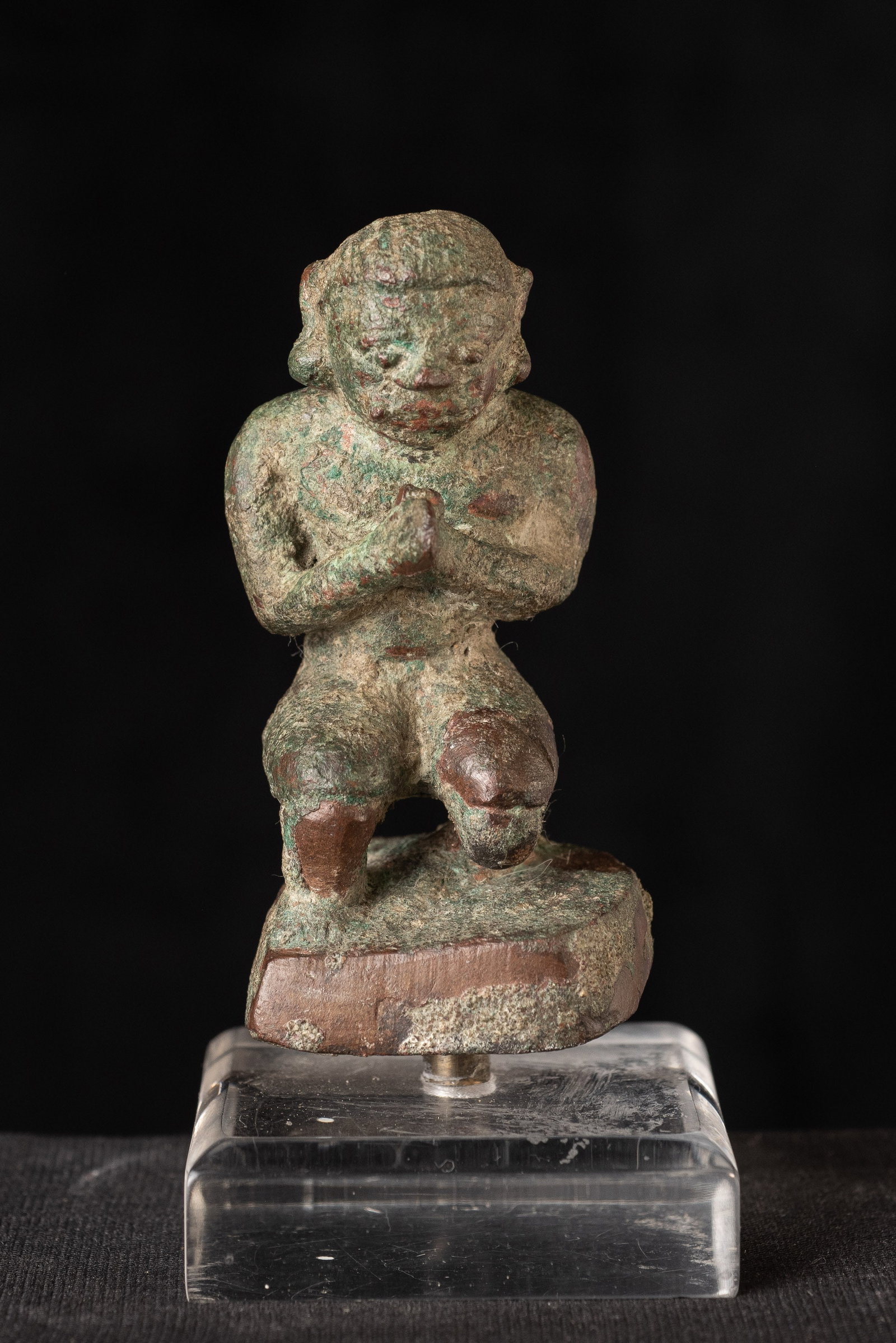 Highly uncommon Pre-Khmer Cambodian giant with serene countenance and a very gentle, sweet face.: Highly uncommon Pre-Khmer Cambodian giant with serene countenance and a very gentle, sweet face (looks like he has betel-nut stuffed into one of his cheeks!) kneeling in devotion. I've never seen some