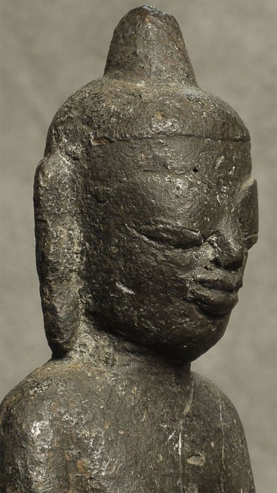 10-12thC/earlier Solid-Cast Burmese Mon (?) Standing Iron Buddha- Truly Unique: This is a very rare early Mon-style solid cast iron standing Buddha from Burma, probably in the rage of the 10th to the 12th centuries. He is a one-of-a-kind- I've seen related pieces, but never