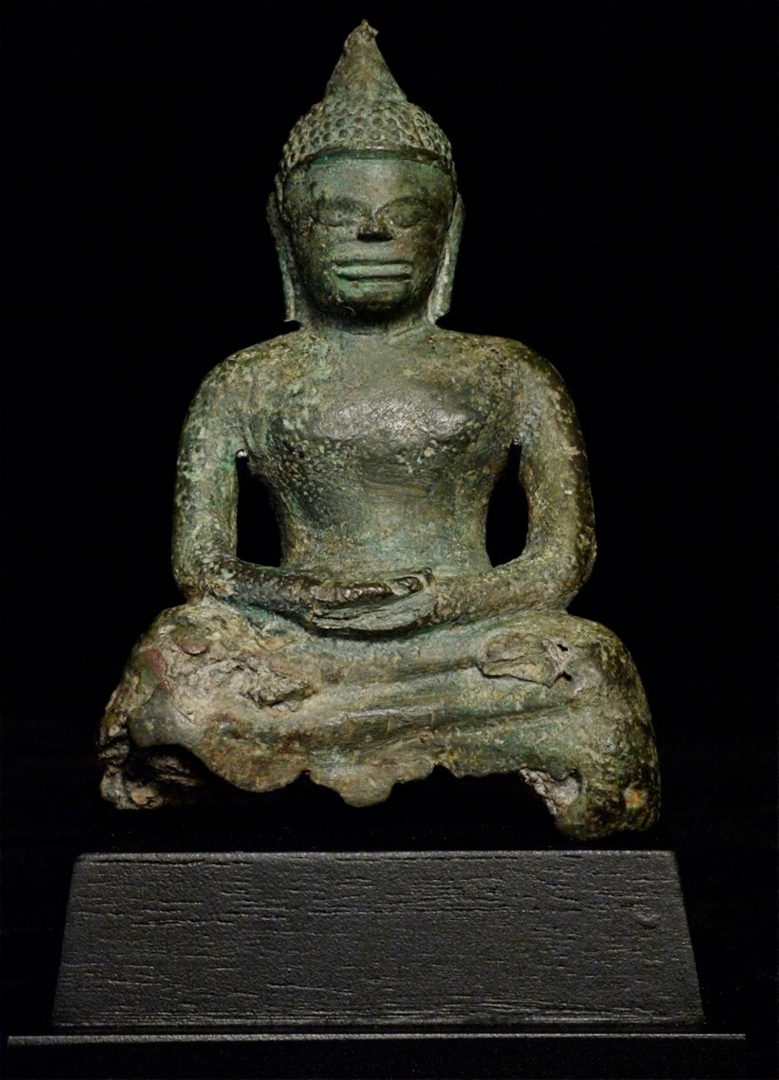 7-9thC Dvarati Buddha, 5.25" Tall-Early, Authentic, Powerful: 7-9thC Dvarati Buddha from Cambodia or Thailand. Casting flaws (original) on the back. He has sat in deep concentration for more than 1300 years! It sits 4" tall, and the custom base elevates it to 5.