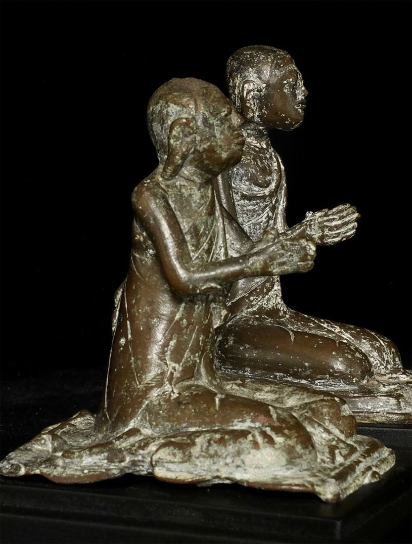This is a pair of Burmese 18/19thC bronze monks.: This is a pair of Burmese 18/19thC bronze monks. They are quite unusual in that while they are provincially cast, each is quite individual in nature, and do not appear to have been formed in molds.
