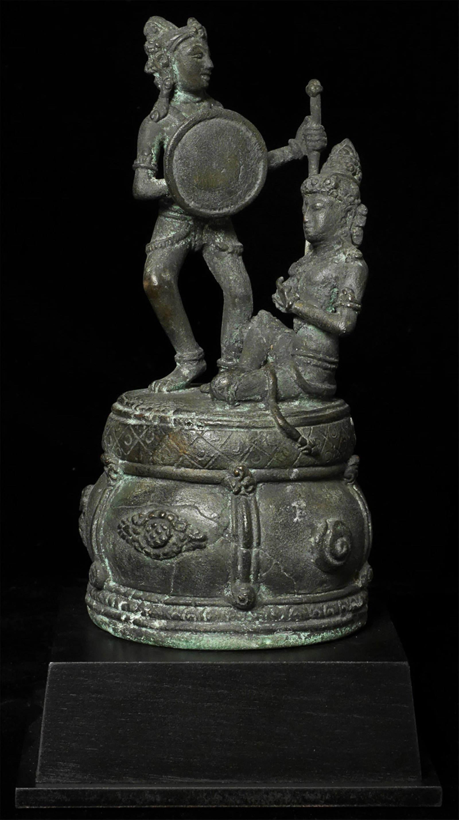 14/15thC Indonesian Majapahit Narrative Bronze (Hindu?) Sculpture-RARE: Indonesian Majapahit era, narrative (Hindu?) sculpture. 9 3/8 inches on a custom stand. Loss of the lower right arm of the sitting figure. Extremely rare authentic 14thC period piece. Never seen