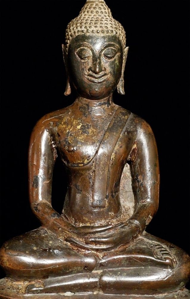 Very special smile on this 15thC Thai Sukhothi style: Very special smile on this 15thC Thai Sukhothi style Buddha- one of the most special smiles of any type of Buddha from any period from any country (in my opinion). There is an unbounded joy that radia