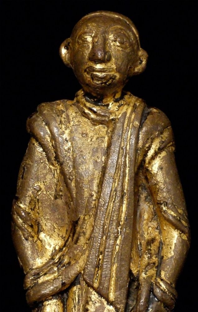 18C or earlier Burmese bronze monk. 8 inches tall-Special Presence: Very early Burmese bronze monk. It is 8 inches tall (10 3/8 inches on a custom stand) and nearly or all solid cast. It is a rare type that is hard to identify definitively. He looks to have a very
