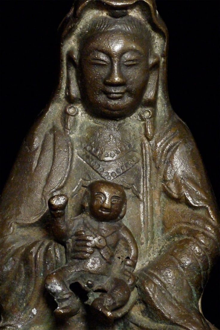 18/19thC Chinese bronze Quanyin holding baby-Inscription on the back!: Fine 18/19thC Chinese bronze Quanyin holding babysits 7 3/8 inches tall, height on custom stand is 9.5 inches. Extensive inscription on the back. Wonderful daces on both the Quanyin and the baby