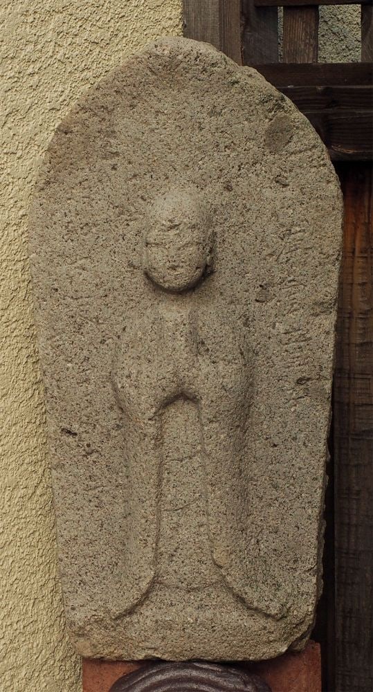 Beautiful and large 19thC Japanese stone "Jizo".: Beautiful and large 19th Japanese stone "Jizo". Often found outside villages and homes for protection, especially for children. This one has lovely proportions and remains an inscription. Probably