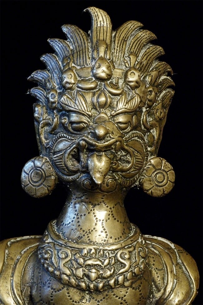 19thC Nepalese fierce bronze deity. Powerful!!: Antique Nepalese fierce deity. Good size at 10 1/4 inches tall, 7 inches wide, and 3 1/8 inches deep. Significant wear suggests may be 18thC or earlier. Excellent detail still shows through the wear.