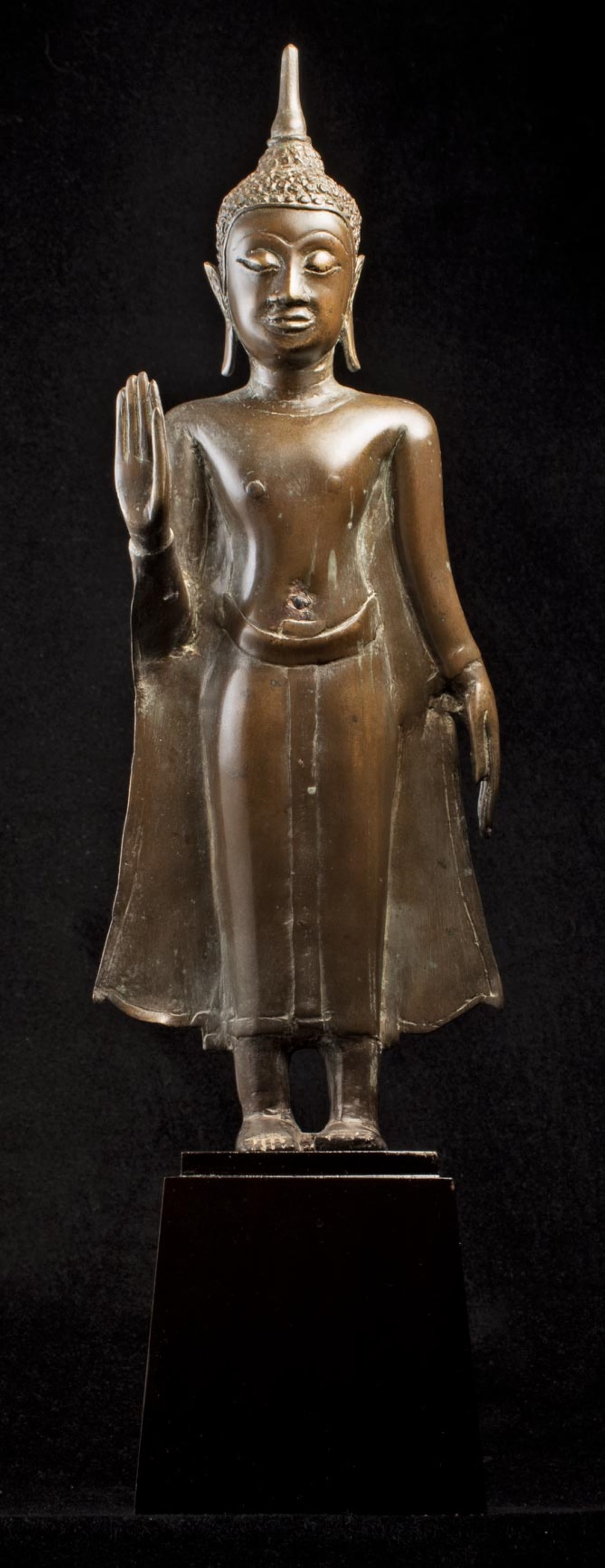 Lovely 15thC Thai bronze Buddha with sweet face.: Lovely 15thC Thai bronze Buddha with sweet face. This piece measures at 16 inches tall total. The base measures 3 3/4 inches tall x 3 1/2 inches wide x 3 1/2 inches deep and the bronze itself