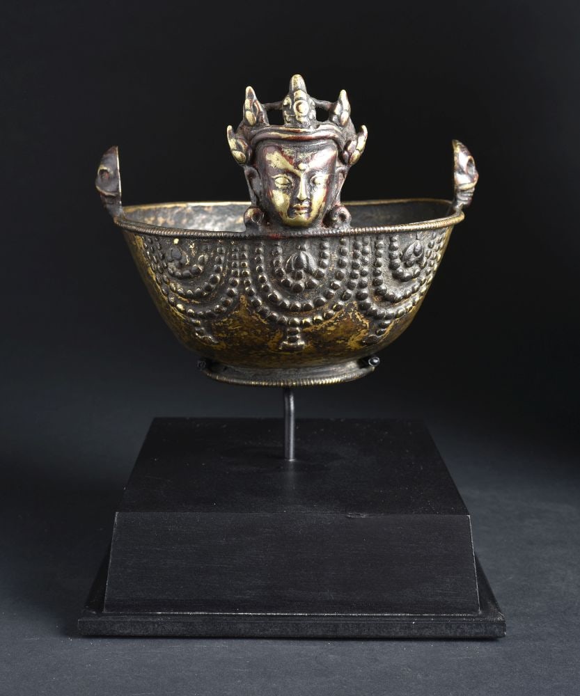 15/16th Tibetan Bronze Skull Cup. Well Cast. Remains of Gilding (nearly life-size): 15/16thC Tibetan or Nepali Bronze Skull Cup. Quite (nearly life-size) at 8 inches deep, 6 inches wide, Approximately 5 inches tall, 9 7/8 inches tall on a custom stand. Well-cast -possibly Newari