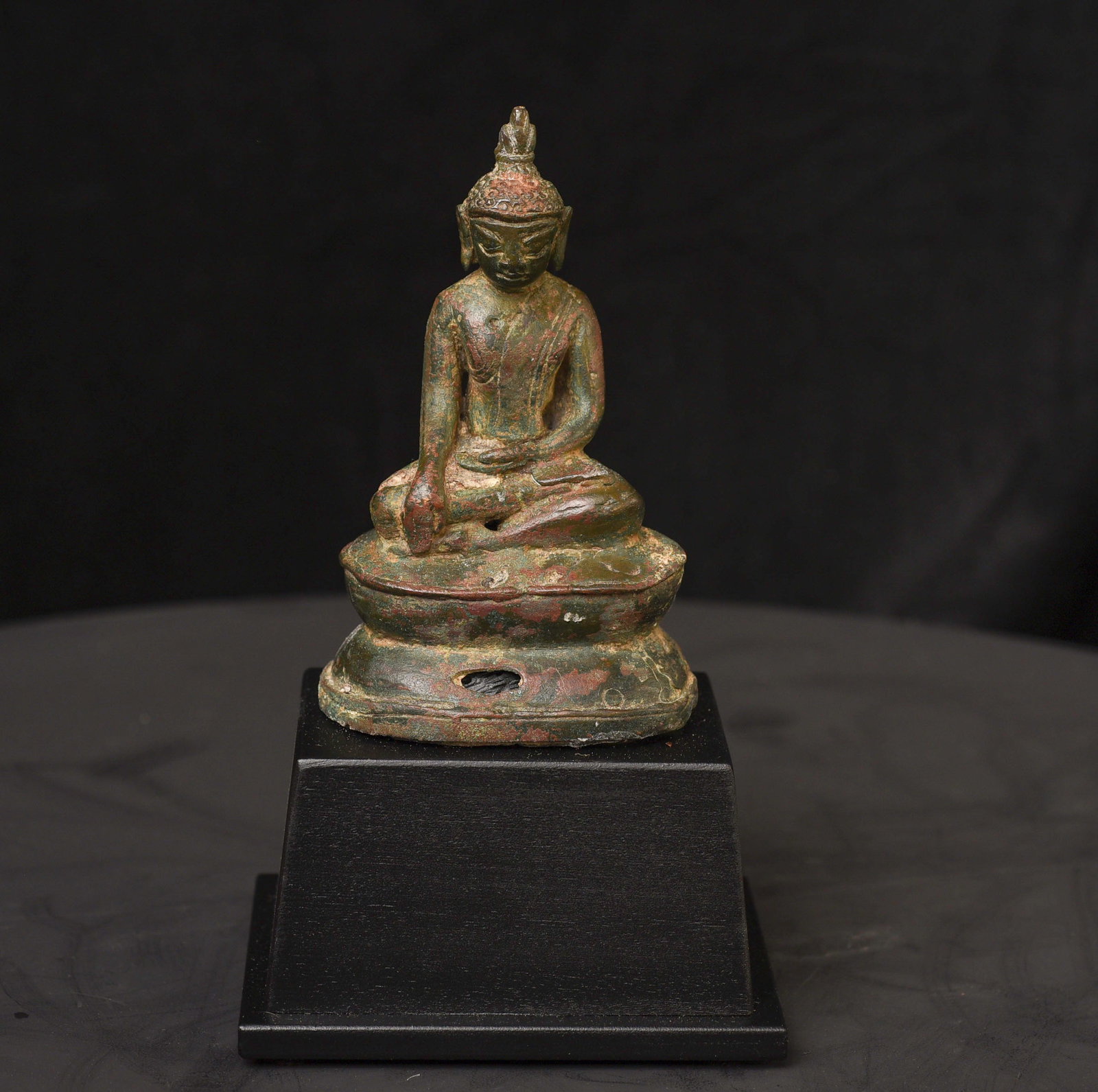 14thC Burmese Buddha, with elements of Pagan, Ava, and Mon.: 14thC Post Pagan Burmese Buddha in a transitional style, with elements of Pagan, Ava, and Mon. Sits 4.25 inches tall Not including the newly added museum-style base. Rare Domestic Insurance included.