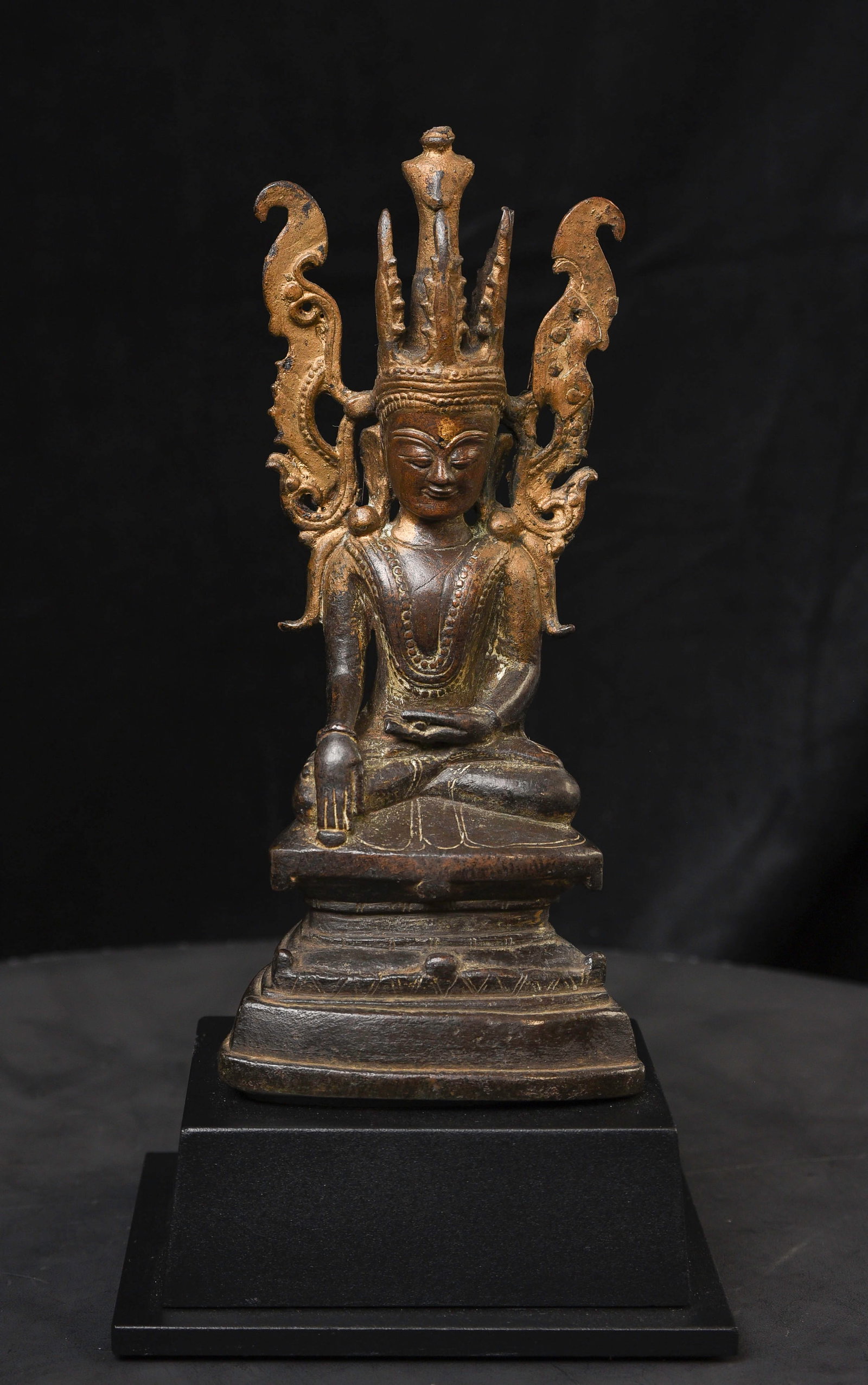 18thC Burmese Shan style "Jambupati" Bronze Buddha.: 18thC Burmese Shan style "Jambupati" Bronze Buddha. An exceptional example of its type, with a face that brings a smile to all who lays eyes upon him. Repairs to the wings of his crown (typical due
