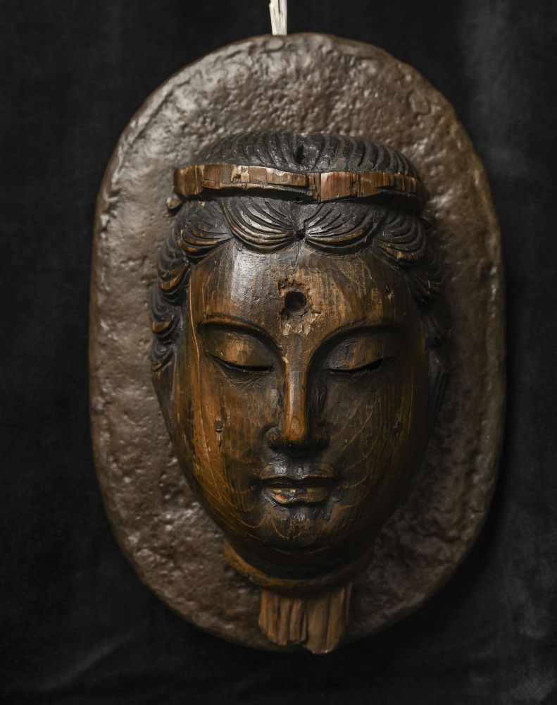 14thC Japanese Muromachi Buddha face on recently sculpted bronze custom mount. Large,: Beautiful 600+ year old Muromachi Buddha face. Mounted to a custom wall mount created by a metal sculptor (the piece is removable)-it originally was part of a 3 to 4-foot tall 14C/earlier Japanese woo