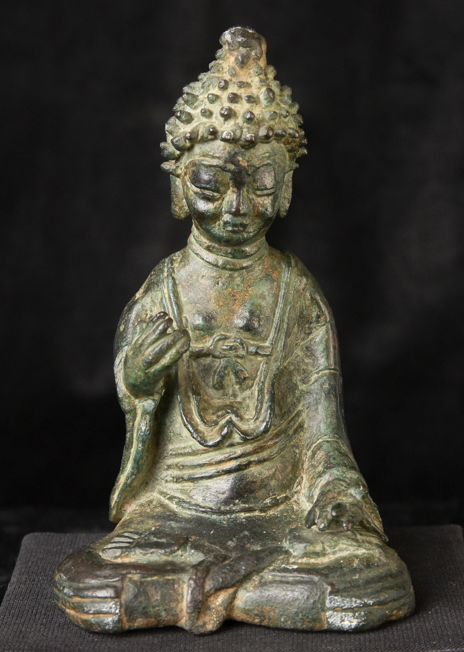 Rare Early Korean Bronze Buddha with Jade Patina: Very early and rare Korean bronze Buddha. Based on the open-back construction, the casting method, the sculptural style, the patina, and the overall feel, this figure is almost certainly 10th century 