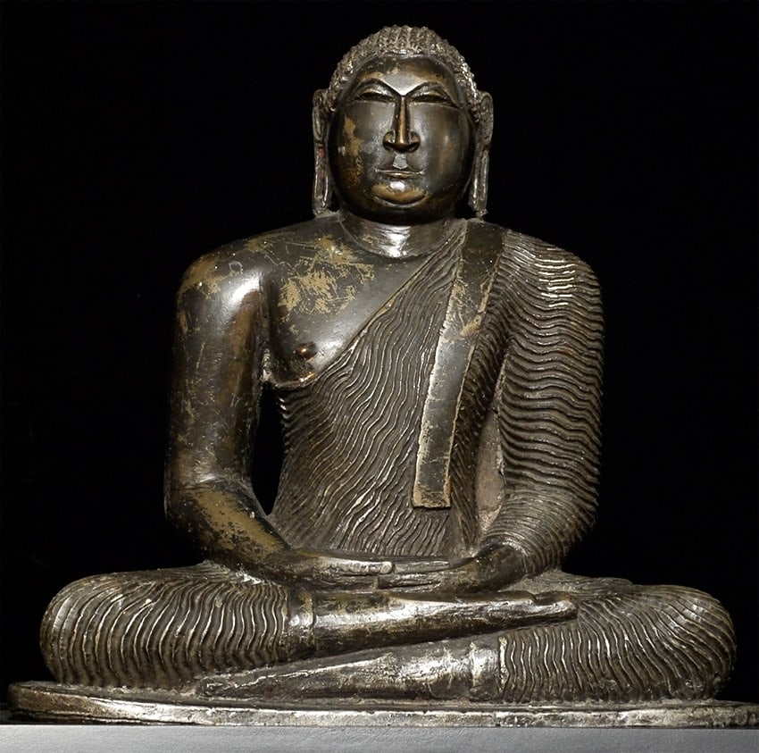 Exceptional Large 18thC (or Earlier) Sri Lankan Kandy Style Buddha: 18th Century, Possibly Earlier — Very Large and Exceptionally Heavy Sri Lankan Kandy-Style Buddha. With echoes of much earlier Lankan styles, this is an unusually massive and powerful example of the