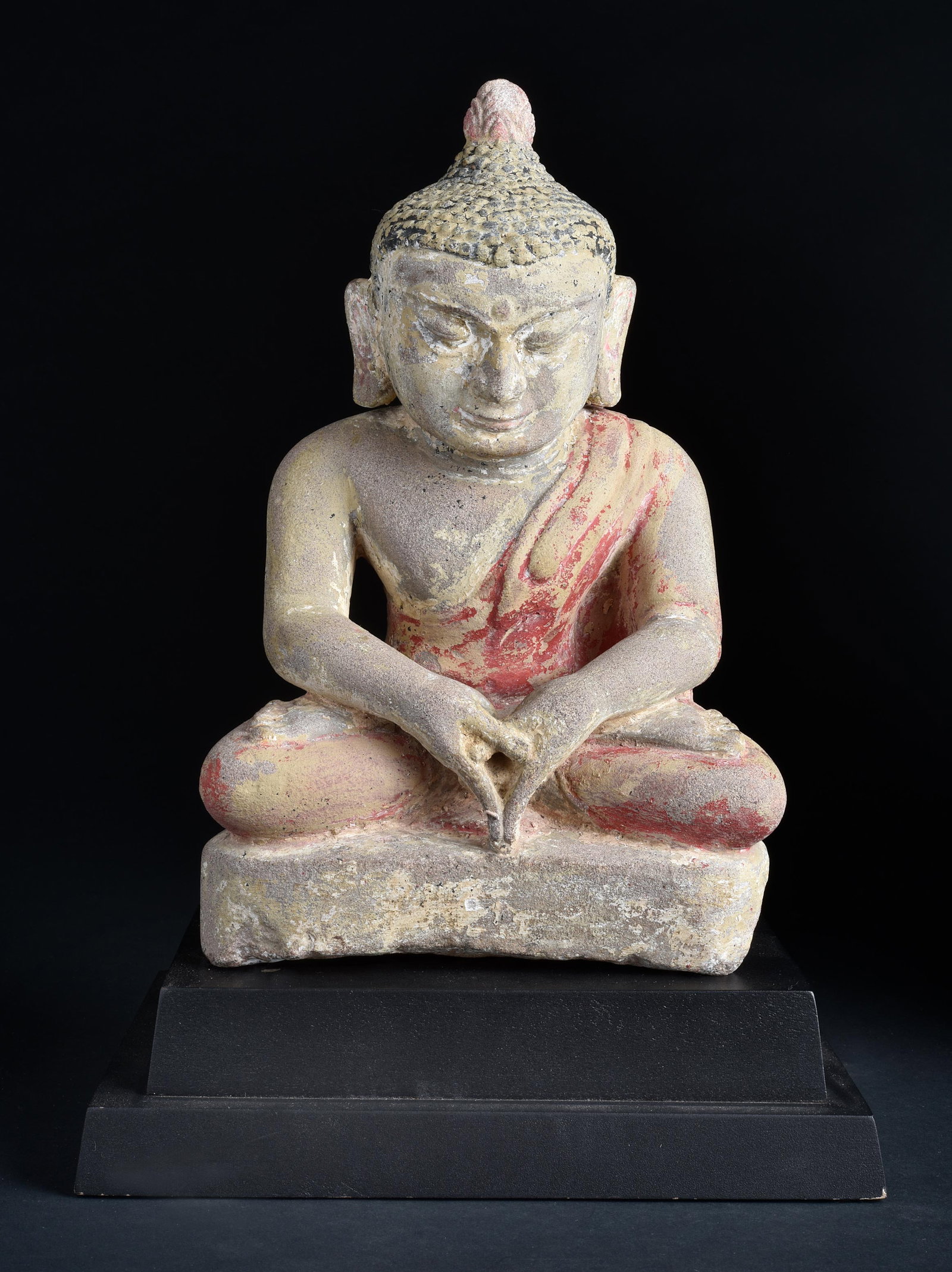 Exceptional Burmese Pagan Stone Buddha. Deep Meditative Expression: An all-time favorite. A genuine Burmese Pagan-period stone Buddha, depicted in deep concentration, with a presence that fills the room. Traces of the original red, black, and white polychrome still cl