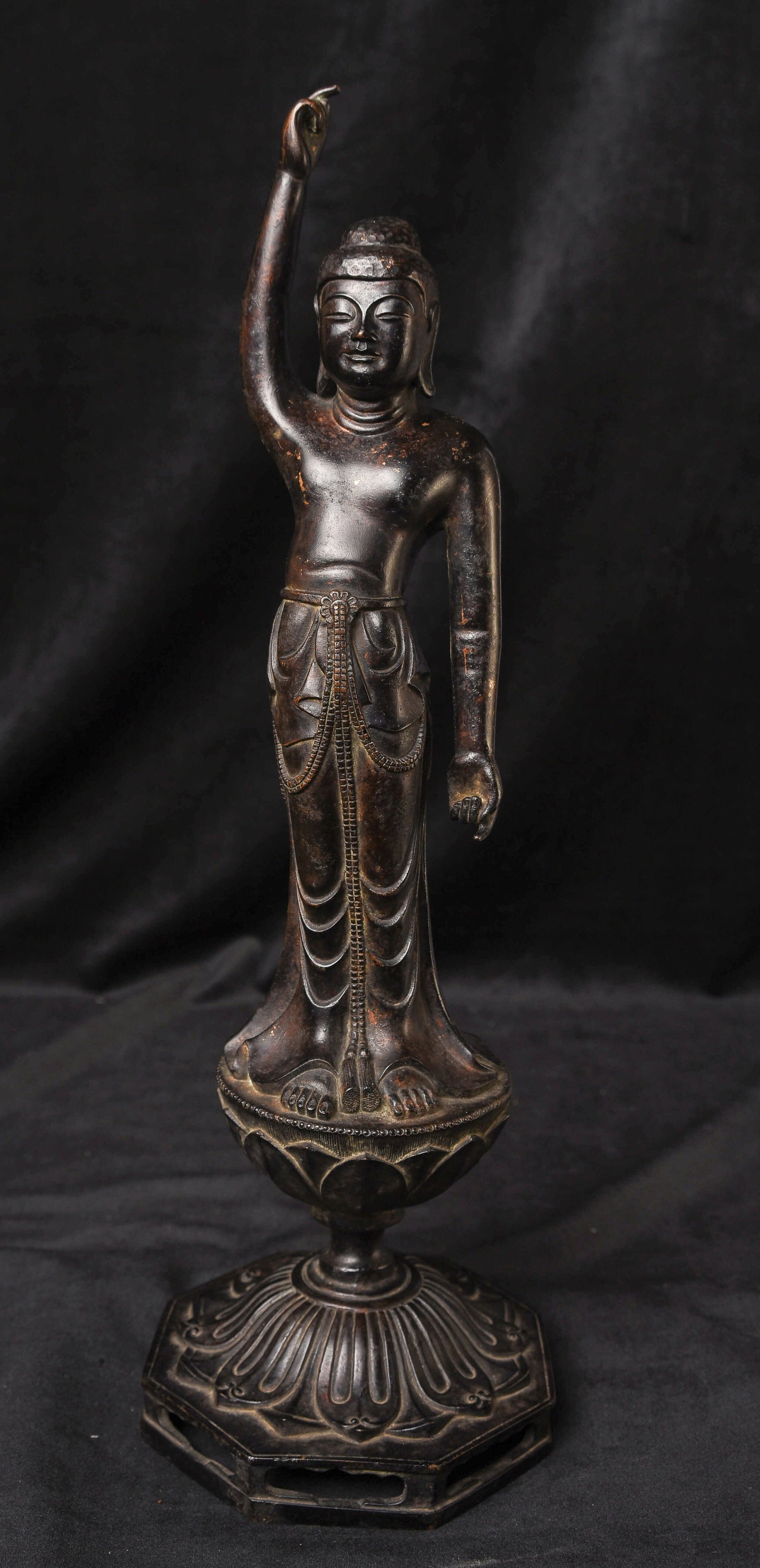 Late 15thC Japanese Bronze Baby Buddha Pointing to Heaven and Earth: Japanese Bronze Baby Buddha, Late 15th Century (Azuchi/Momoyama Period) This beautifully cast Baby Buddha represents the moment immediately following the Buddha's birth, with one hand pointing toward