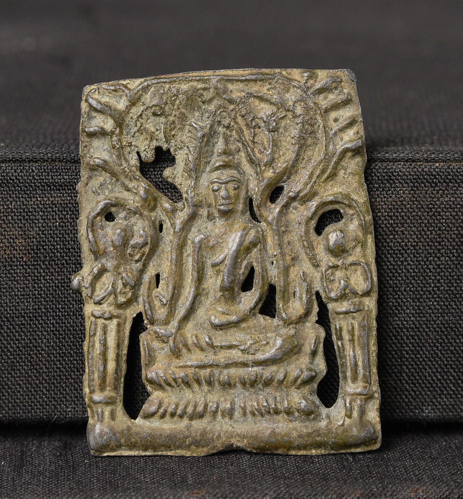 Burmese bronze plaque or amulet from an old collection of SE Asian amulets and small Buddhist: Burmese bronze plaque or amulet from an old collection of SE Asian amulets and small Buddhist objects collected in the 1970s and 80s. 16/17thC Mon style. Stands 1.75 inches tall. - ( 1.75"H x 1.375"W 