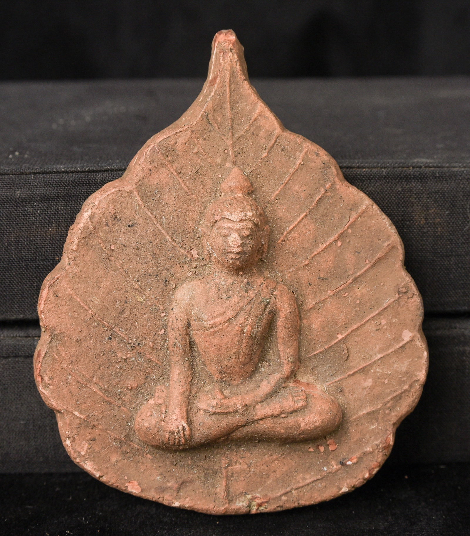 19thC Burmese Buddha in a leaf background- rare type.: 19thC Burmese Buddha in a leaf background- rare type- almost 4 inches- flattened nose- otherwise great shape. - ( 4"H x 3.25"W x .75D ) - 100g