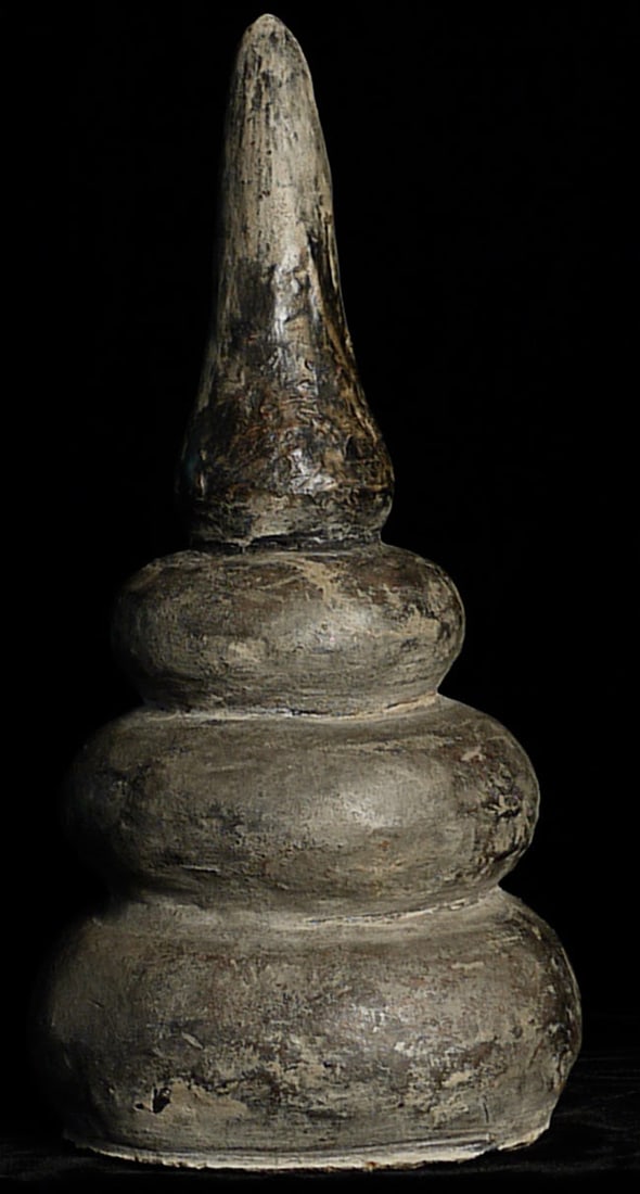 Very old Stupa-probably the top of a much larger (architectural) piece.: Very old Stupa-probably the top of a much larger piece. Hard to date with accuracy. At least 19thC-probably much older. Stands 12.25" tall, has a diameter of 5.5"