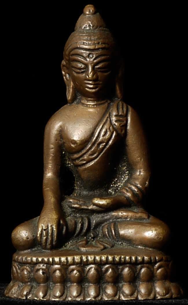 Vintage bronze seated Buddha. Measures 3.25" tall, base: Vintage bronze seated Buddha. Measures 3.25" tall, base is approximately 1 7/8" x 1.25".