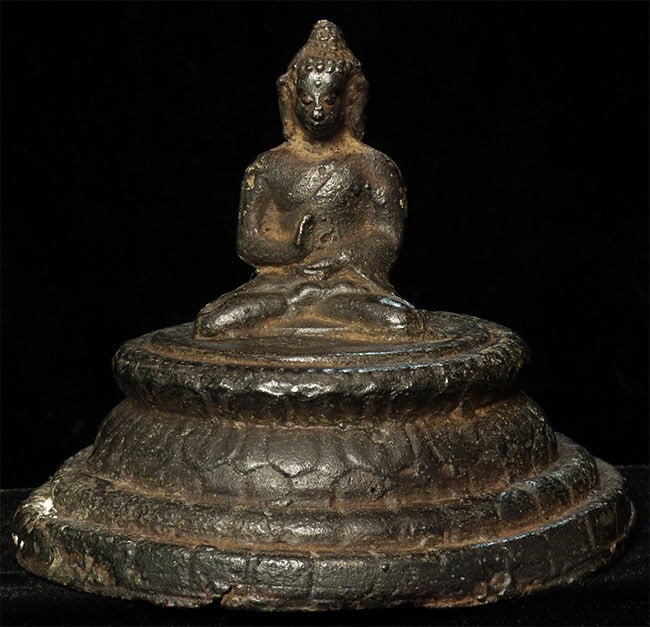 Mystery Buddha.: Mystery Buddha. Probably Java or Indonesia, 19thC or earlier. Fantastic base. 3.5 inches tall, bottom diameter of 4 3/8 inches