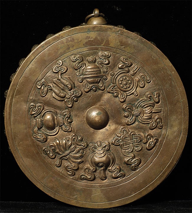 Stylized Antique Mongolian Copper Mandala.: Stylized Antique Mongolian Copper Mandala. Used to meditate on the freedom of suffering for all sentient beings. Excellent quality repousse work- exceptional example of its type. Diameter of 5.25 inch