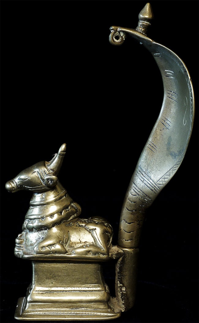 Antique Indian Bronze/Brass Nandi.: Antique Indian Bronze/Brass Nandi. Sits 6 inches tall, hood is 3 1/8 inches wide.