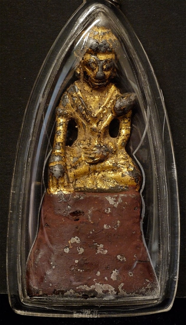 Antique Thai or Lao Buddha Amulet w/ Lotus: Antique Thai or Lao Buddha with lotus. In an amulet case, though too large to wear. Most of the original gilding remains. Many copies of this type- this is an authentic old one- probably from the Ratt