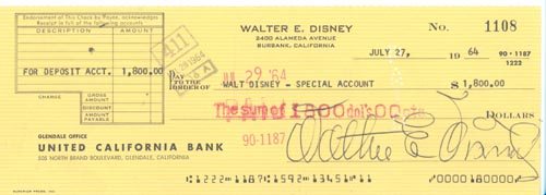 WALT DISNEY CHECK SIGNED: Cartoon artist, animation film producer winning 39 Academy Awards, theme park innovator. Check drawn from "Walter E. Disney" account boldly signed "Walter E. Disney", 8.5x3, July 27 1964, payable to "