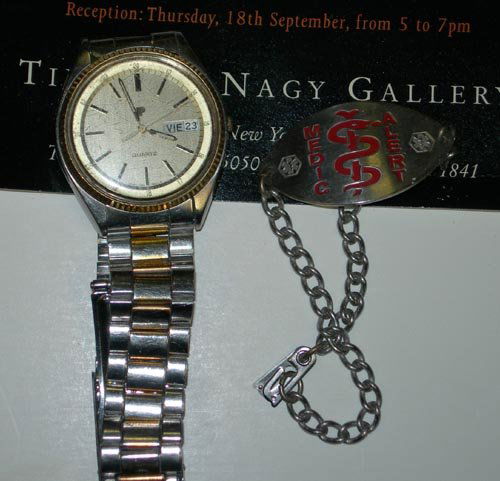 (ALLEN GINSBERG) OWNED AND WORN WATCH & BRACELET: American pre-eminent Beat-era poet renowned for "Howl". UNIQUE Ginsberg collection consisting of his owned and worn Pulsar quartz watch, gold and silver finish, with gold and silver finish metal band