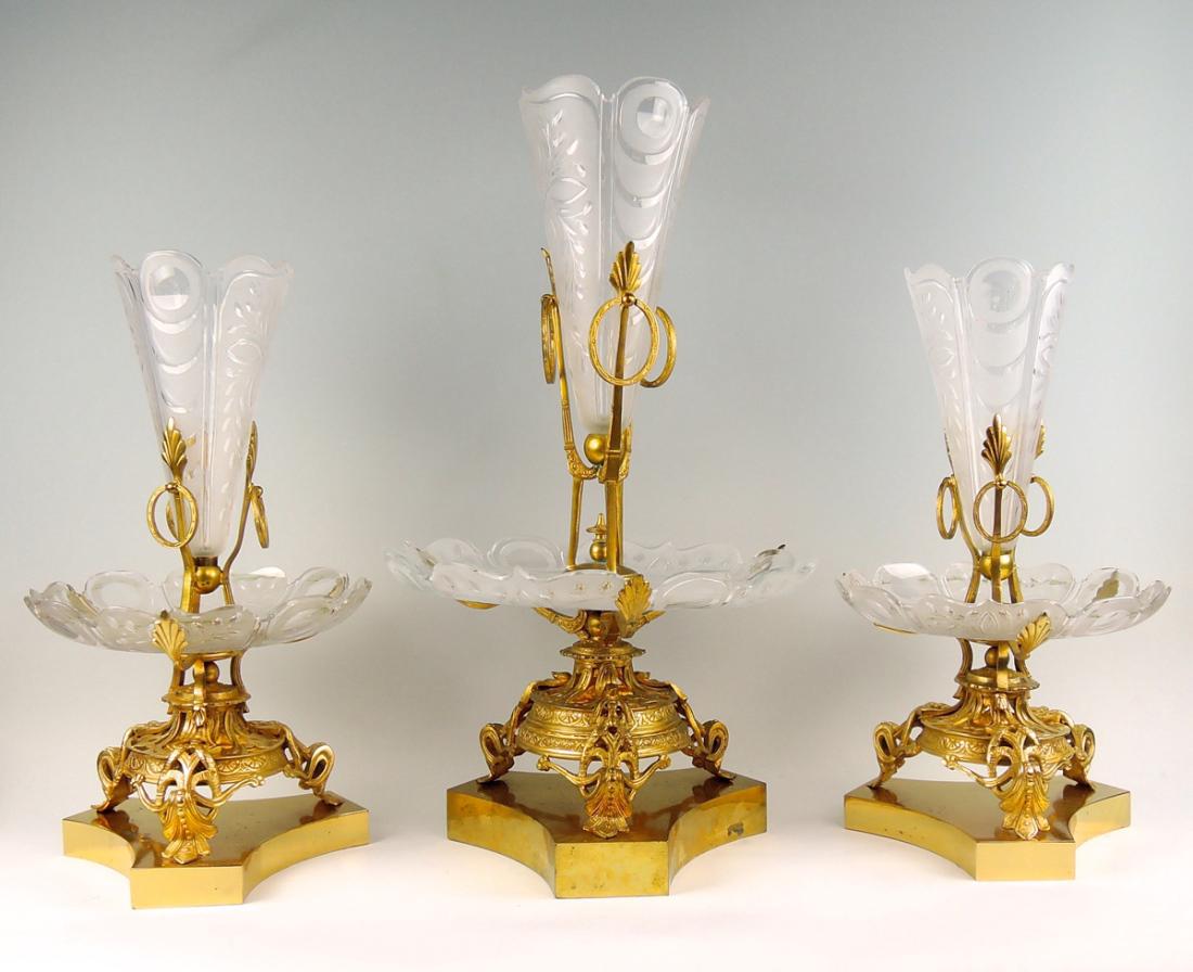 Ornate 3 Pc Dore Bronze & Crystal Epergne Set: Late 19th century, probably French, three ornate Dore bronze with frosted and clear glass epergnes, one larger centerpiece with two slightly smaller, good condition, tallest 22.5"