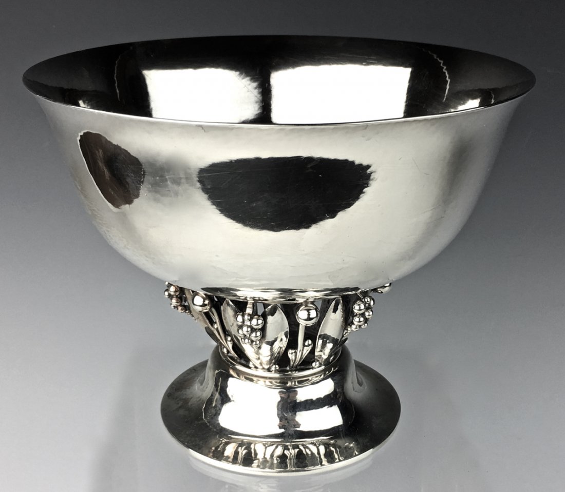 Georg Jensen Sterling Silver Bowl: Circa 1924, designed by Johan Rohde in 1912, with grape and leaf design, of circular form with pierced stem, depicting leaves and clusters of grapes on a spreading foot, design no. 197, impressed mark