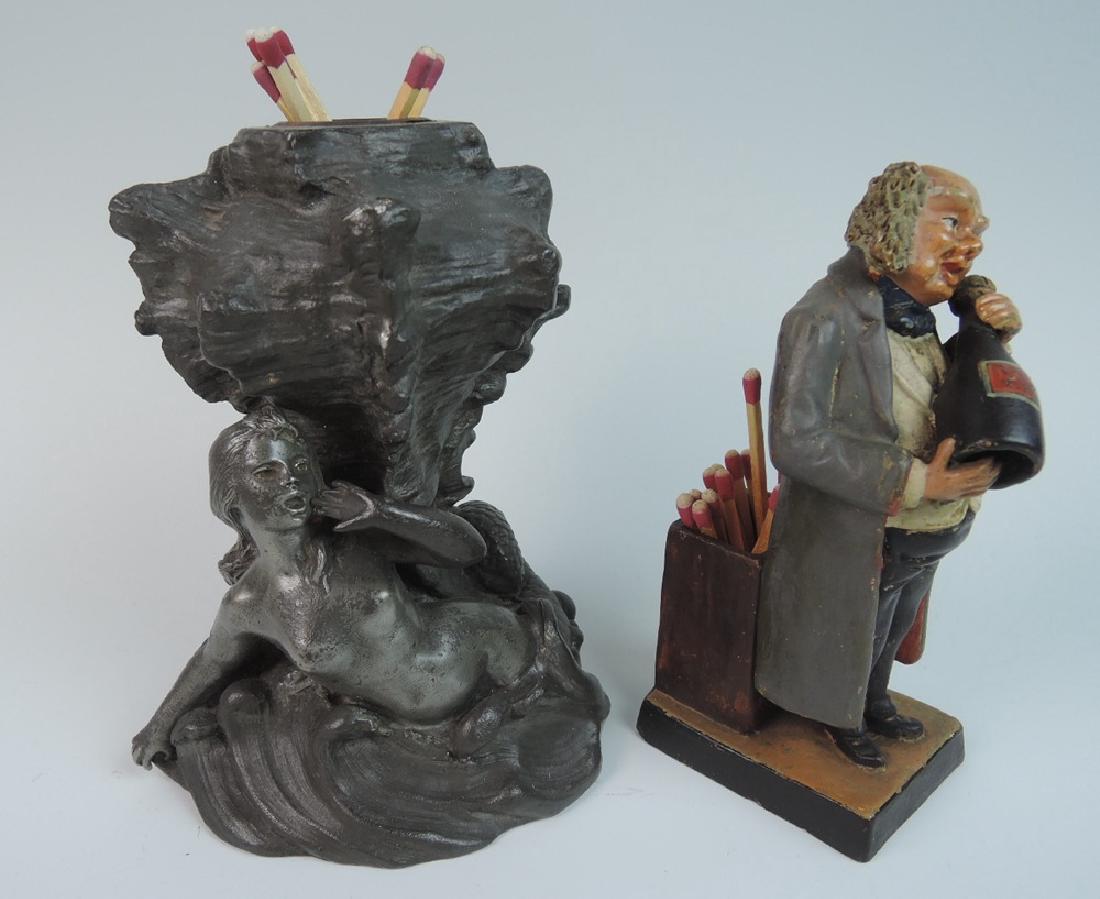 2 Antique Butler & Mermaid Matchholders: Circa 1900, probably Austrian, a terra cotta figure of a butler holding a champagne bottle, marked "E E 17", good condition, 5.5" tall, Circa 1900, a mermaid in the waves with seashell, 5.5" tall