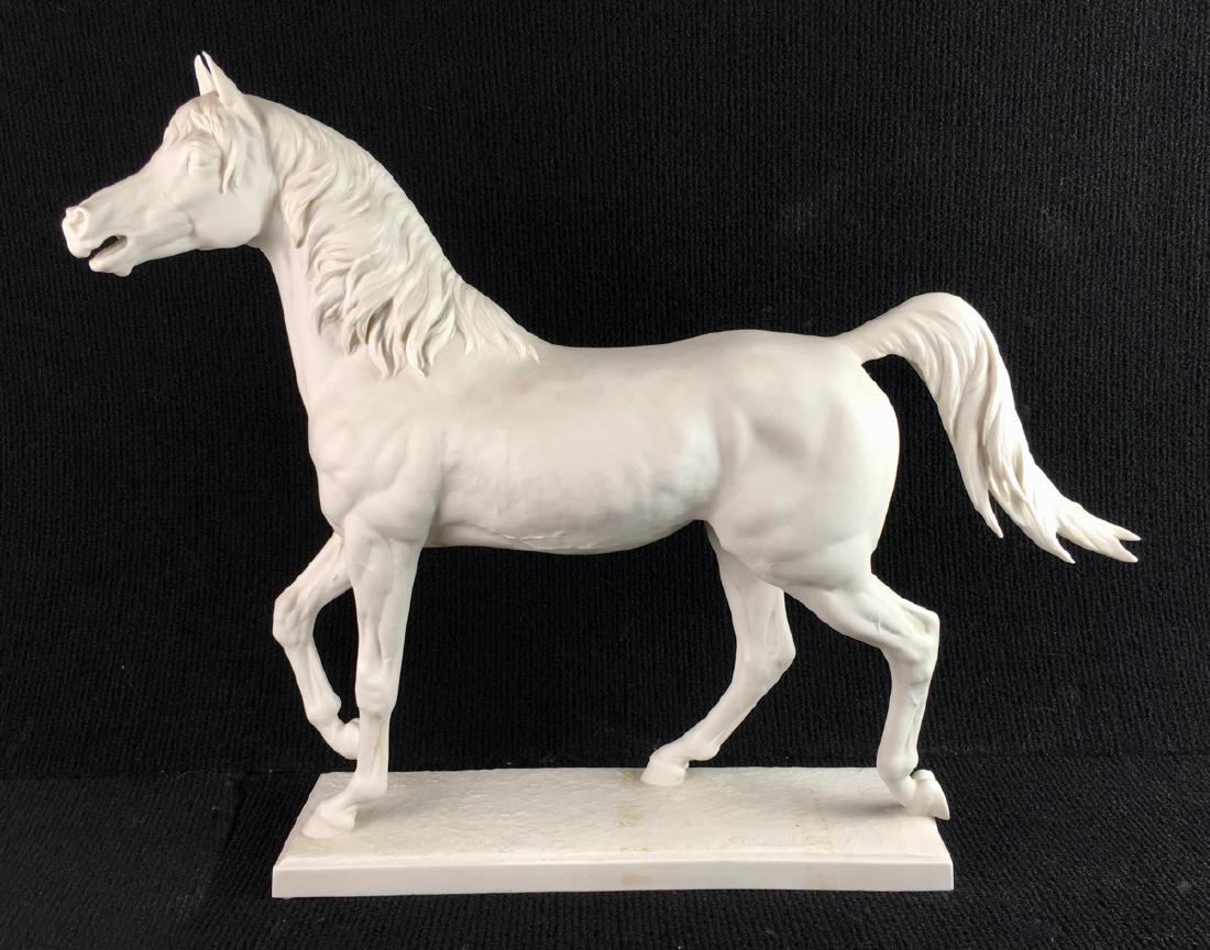 Large Hutschenreuther "Halla" Bisque Horse: Horse figurine crafted of fine quality German porcelain, features a stunning Arabian white stallion in gallop stride, marked with Hutschenreuther green mark and also impressed Gunther Granet, very goo