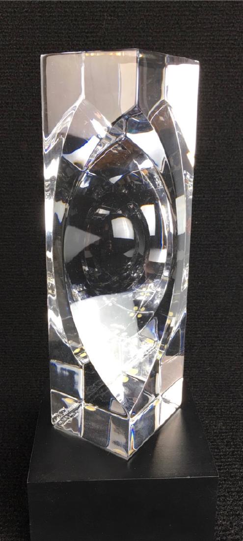 Orrefors "The Magic Eye" 1972: Sven Palmquist for Orrefors consists of an extremely heavy block of crystal cut with fine beveled edges and two large eye shaped excavations on opposite sides, signed "Orrefors Exp P. 761-72 Sven Palm