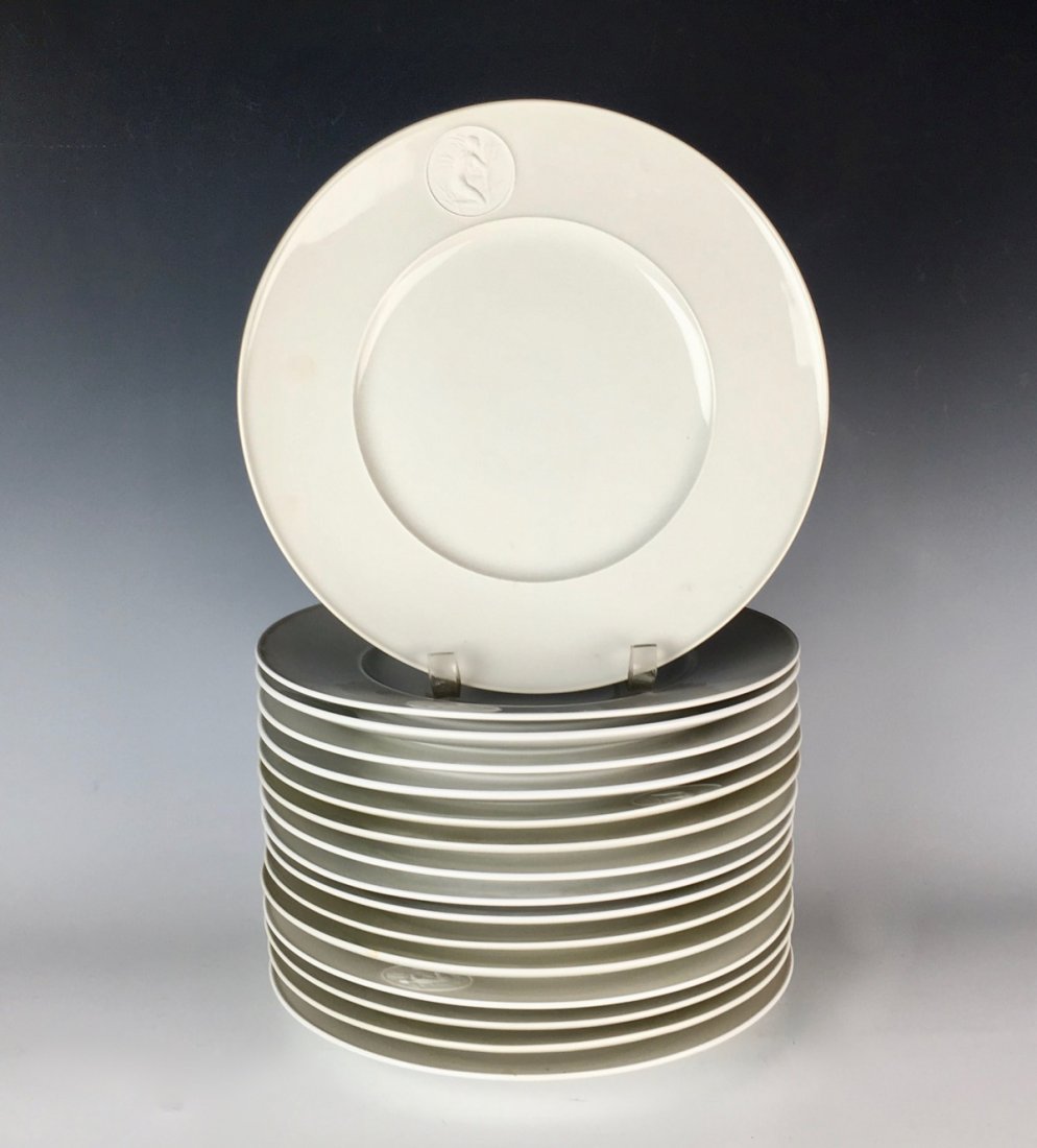 16 KPM Porcelain "Arkadia" Dinner Plates w/ Nudes: Circa 1938 Germany, each plate has an unglazed circular medallion at the rim enclosing a nude bather crouching among reeds, underglaze blue scepter mark, also having various impressed numbers and lett