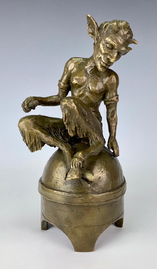 Bronze Grotesque Figurine: 20th century, nicely patinated bronze of a satyr sitting on top of a domed stand, signed "Milo", very good condition, 10" height