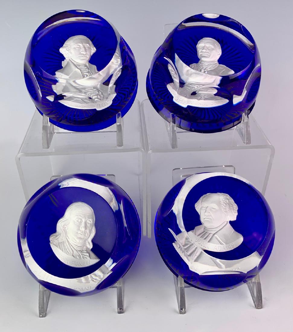 4 French Glass Paperweights of Notables: Having George Washington, John Adams, Benjamin Franklin, John Paul Jones, each with acid stamp "Franklin Mint", very good condition, 3" diameter, 1.75" height