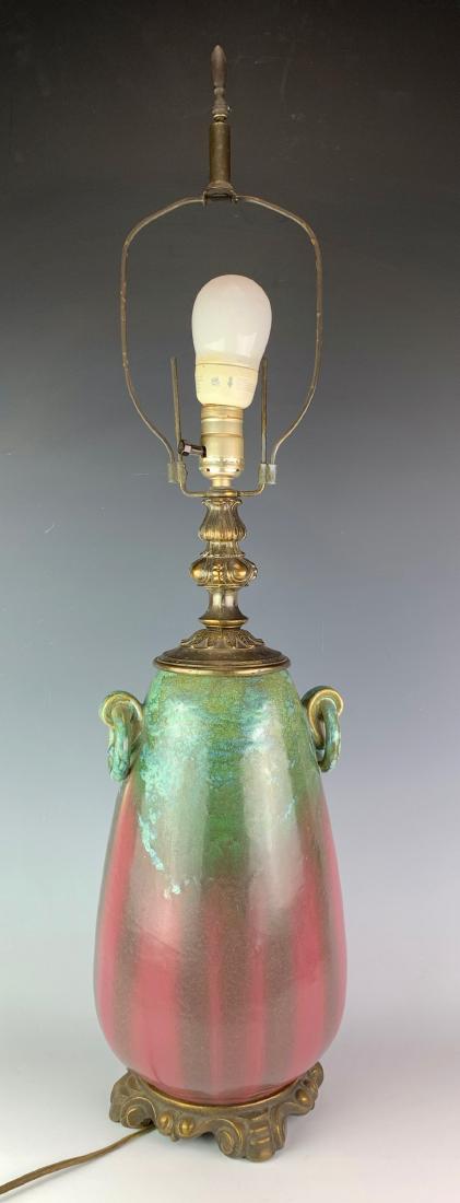 Large Fulper Table Lamp: Having a wonderful green drip glaze at top which goes into maroon color at bottom with ring handles, signed on bottom "Fulper", very good condition, 12.5" height vase only, 32" height with lamp parts