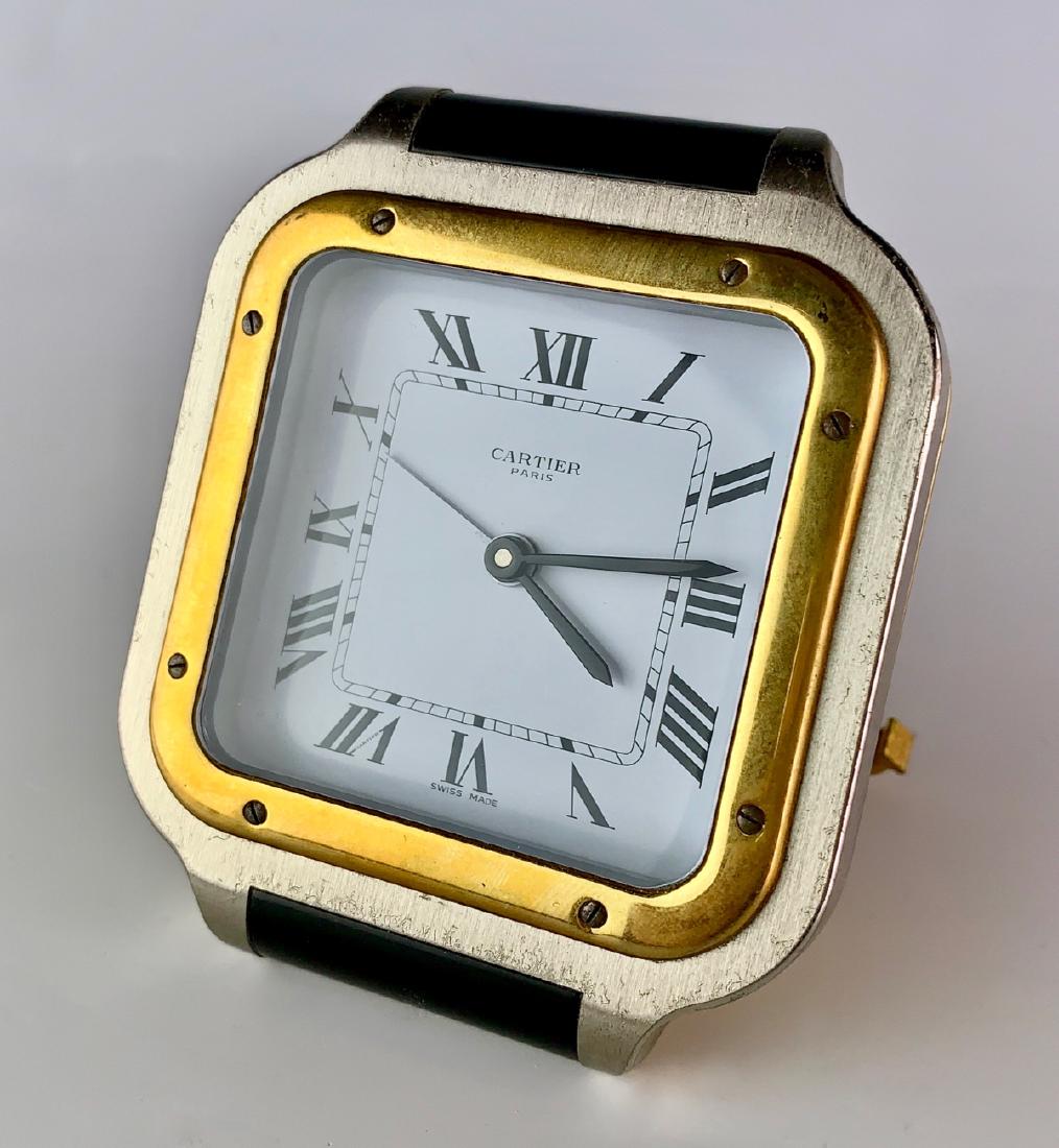 Cartier Desk Clock: Marked on dial "Cartier France", marked on back "Quartz, Swiss Made", serial numbers 7508 0546, in running condition at time of auction, clocks are not guaranteed, very good condition, 3.375" x 2.75"
