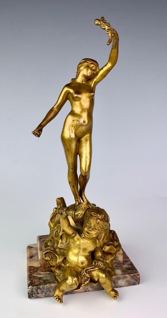 Dore Bronze Nude w/ Cherub Figural C. 1880: Depicting a standing nude lady and cherub in gilt bronze, mounted on a stepped pink marble base, unsigned, very good condition, 9.25" height