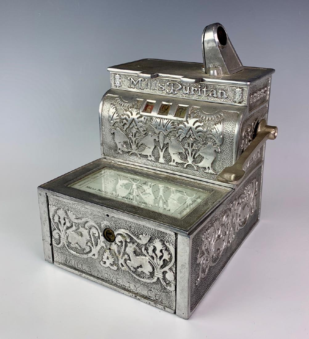Mills 5 Cent Improved Trade Stimulator C. 1900: Having a cast aluminum case decorated with birds, winged griffins and ornate decorative work, has printed card printed with name "Mills Novelty Company, Chicago USA", not in working condition, missing