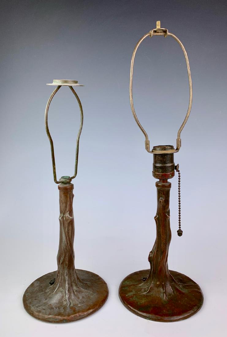 Pair Handel Tree Trunk Boudoir Lamp Bases: Both having a brown patina, tallest one is signed "Handel" and missing cap and finial, other has worn patina commensurate with age and is also missing cap and finial, missing socket as well and is not