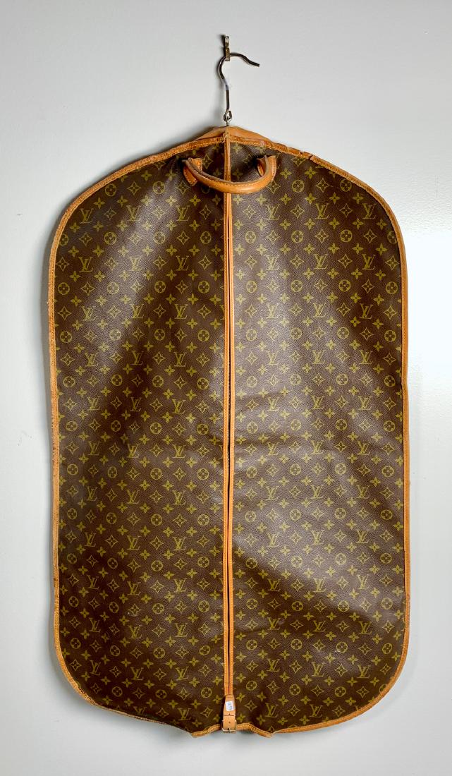 Vintage Louis Vuitton Garment Bag: A few minor small tears in leather tears in leather, 40" x 23"'